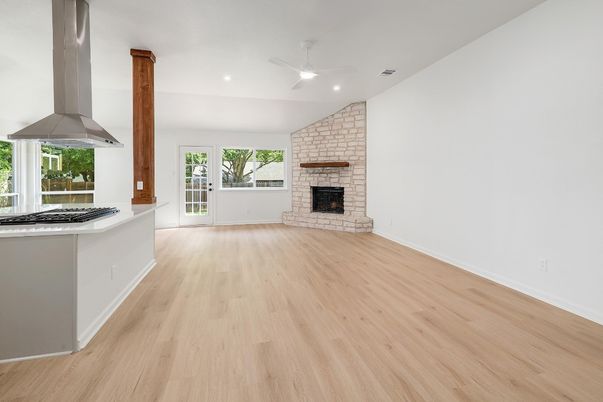 Empty room, Fireplace, Interior, Kitchen, Recessed Lighting, Wood Texture Flooring
