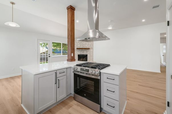Fireplace, Interior, Kitchen, Pendant Lights, Recessed Lighting, Stainless Steel Appliances, Wood Texture Flooring