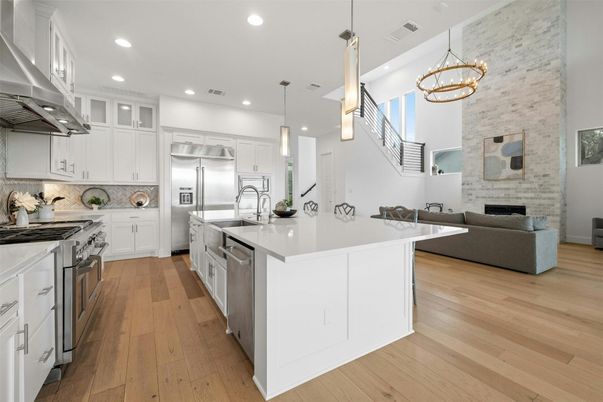 Interior, Kitchen, Pendant Lights, Recessed Lighting, Stainless Steel Appliances, Stone Walls, Wood Texture Flooring
