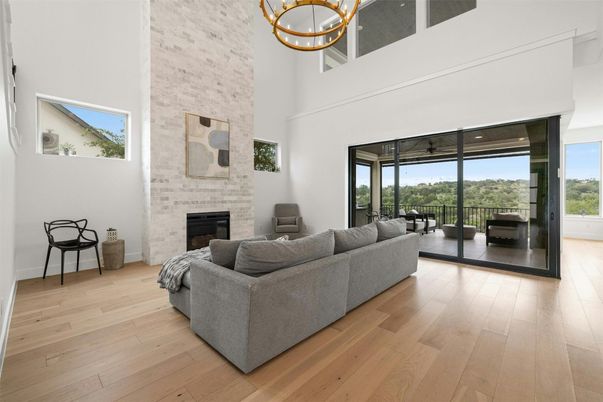 Fireplace, Interior, Living room, Pendant Lights, Stone Walls, Wood Texture Flooring