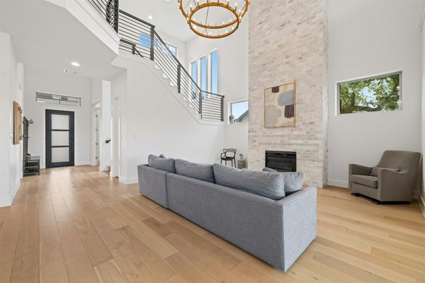 Fireplace, Interior, Pendant Lights, Recessed Lighting, Stone Walls, Wood Texture Flooring