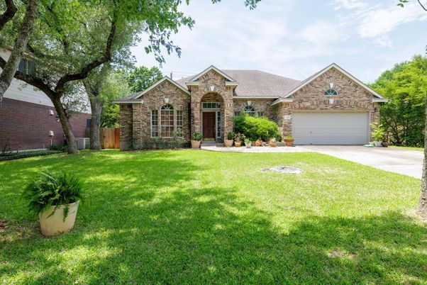 Attached, Backyard, Exterior, Facade, Brick Facade, Brick Traditional