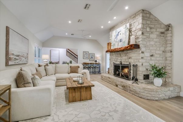 Fireplace, Interior, Living room, Recessed Lighting, Stone Walls, Wood Texture Flooring