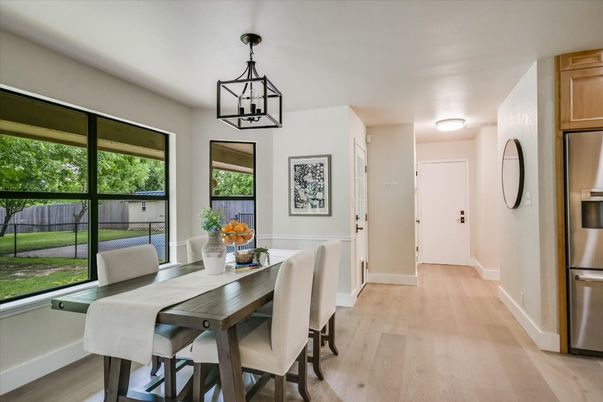 Dining room, Interior, Pendant Lights, Stainless Steel Appliances, Wood Texture Flooring