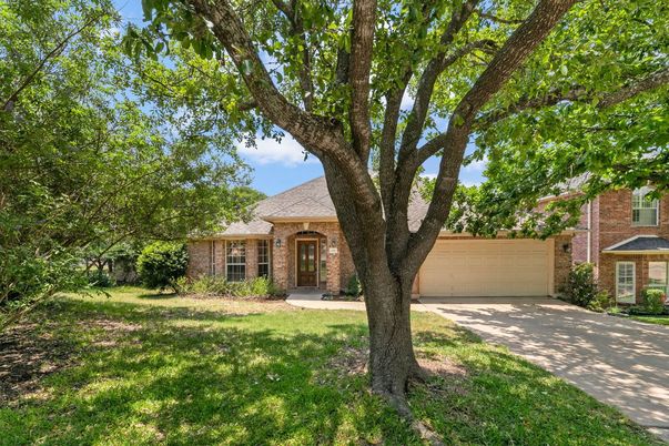 Attached, Backyard, Exterior, Facade, Brick Facade, Ranch