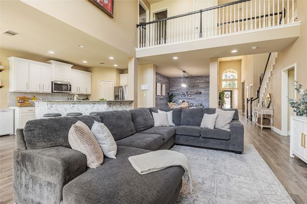 Dining room, Interior, Kitchen, Living room, Pendant Lights, Recessed Lighting, Stainless Steel Appliances, Stone Walls, Wood Texture Flooring