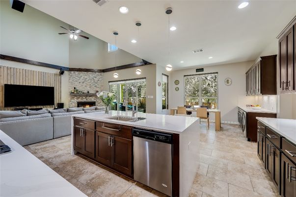 Dining room, Fireplace, Interior, Kitchen, Living room, Pendant Lights, Recessed Lighting, Stainless Steel Appliances, Stone Walls