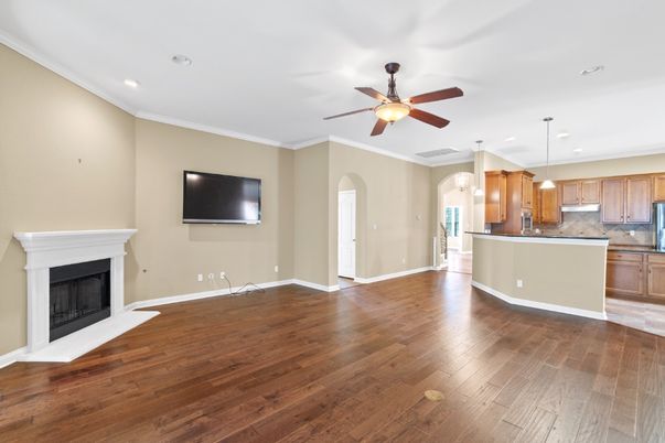 Empty room, Fireplace, Interior, Kitchen, Pendant Lights, Recessed Lighting, Wood Texture Flooring