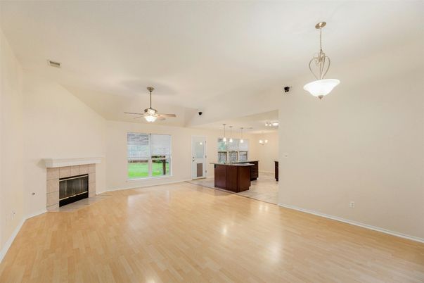 Empty room, Fireplace, Interior, Pendant Lights, Wood Texture Flooring