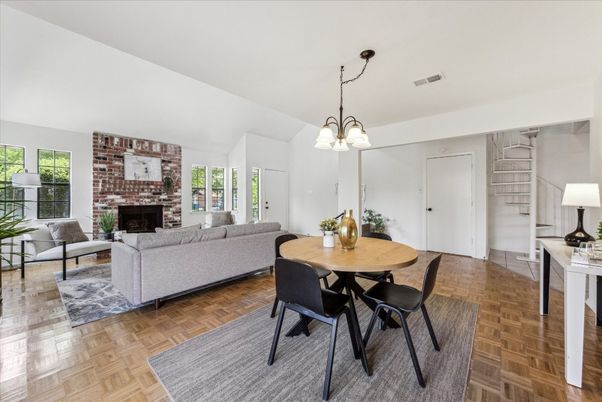 Chandelier, Dining room, Fireplace, Interior, Living room, Stone Walls, Wood Texture Flooring