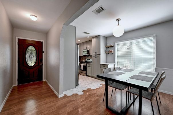 Dining room, Interior, Kitchen, Recessed Lighting, Stainless Steel Appliances, Wood Texture Flooring