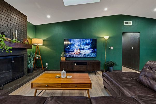Fireplace, Interior, Living room, Recessed Lighting, Stone Walls, Wood Texture Flooring