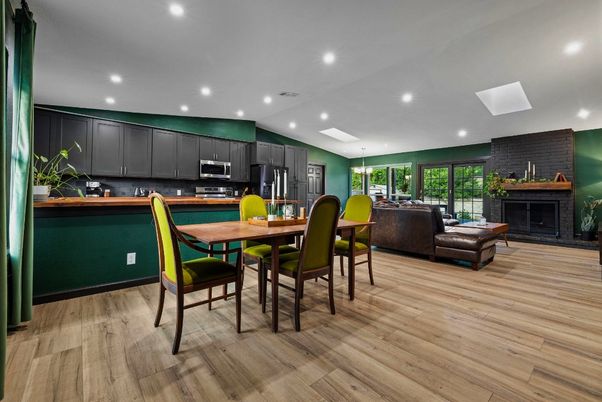 Dining room, Fireplace, Interior, Kitchen, Living room, Recessed Lighting, Stone Walls, Wood Texture Flooring