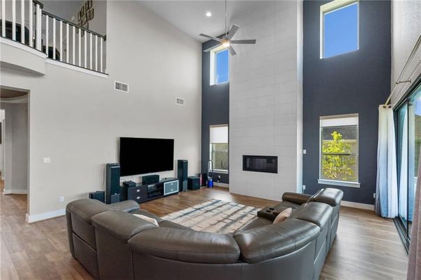 Fireplace, Interior, Living room, Recessed Lighting, Wood Texture Flooring