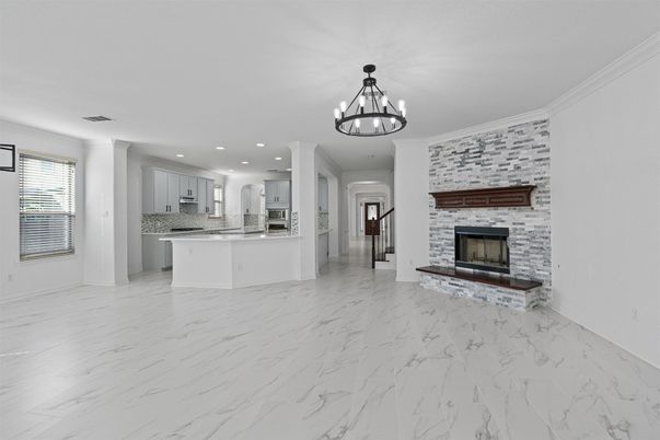 Chandelier, Empty room, Fireplace, Interior, Kitchen, Marble, Pendant Lights, Recessed Lighting, Stone Walls