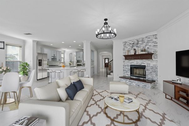 Chandelier, Dining room, Fireplace, Interior, Kitchen, Living room, Marble, Pendant Lights, Recessed Lighting, Stainless Steel Appliances, Stone Walls