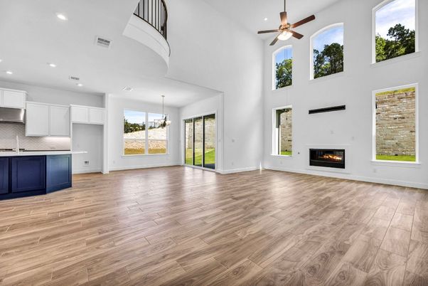 Empty room, Fireplace, Interior, Kitchen, Pendant Lights, Recessed Lighting, Wood Texture Flooring
