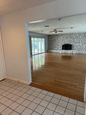 Empty room, Fireplace, Interior, Stone Walls, Wood Texture Flooring