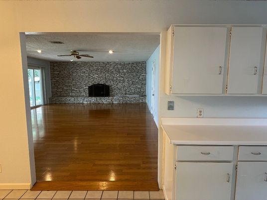 Empty room, Interior, Recessed Lighting, Stone Walls, Wood Texture Flooring