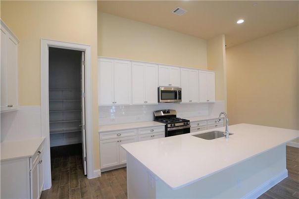 Interior, Kitchen, Recessed Lighting, Stainless Steel Appliances, Wood Texture Flooring
