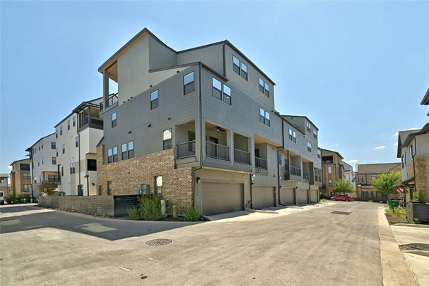 Attached, Exterior, Facade, Brick Facade, Condo Building