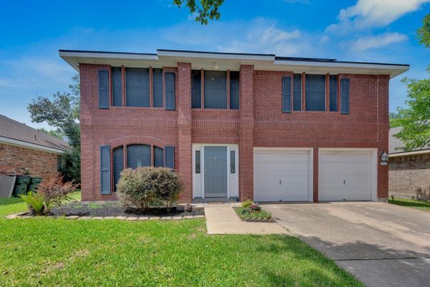 Attached, Exterior, Facade, Brick Facade, Rowhouse