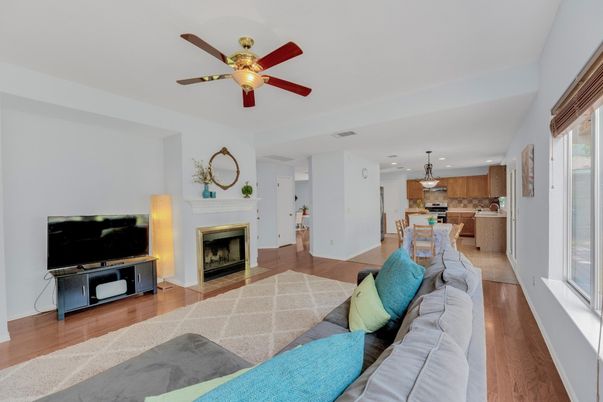 Fireplace, Interior, Kitchen, Living room, Recessed Lighting, Stainless Steel Appliances, Wood Texture Flooring