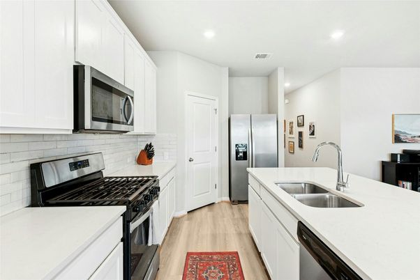 Interior, Kitchen, Recessed Lighting, Stainless Steel Appliances, Wood Texture Flooring