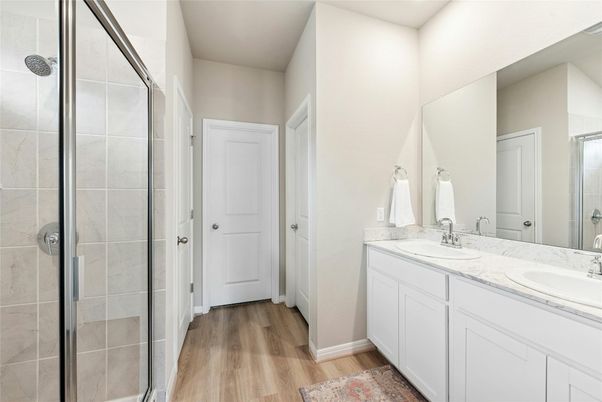 Bathroom, Dual Sink Vanities, Glass Shower, Interior, Wood Texture Flooring