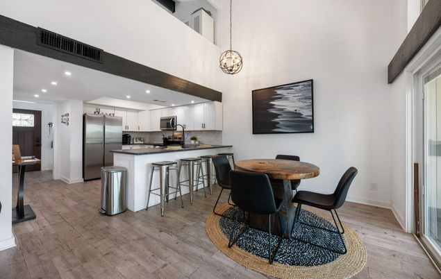 Dining room, Interior, Kitchen, Pendant Lights, Recessed Lighting, Stainless Steel Appliances, Wood Texture Flooring