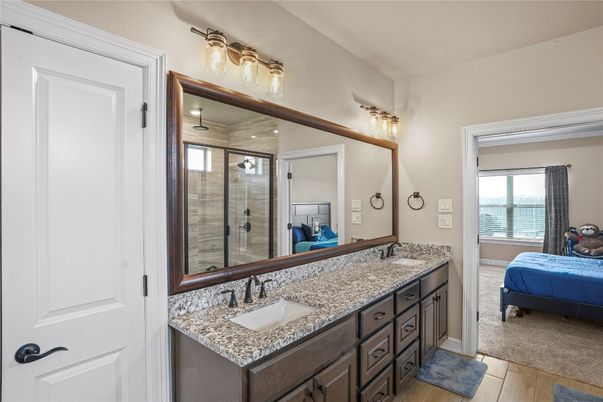 Bathroom, Bedroom, Dual Sink Vanities, Glass Shower, Interior, Wood Texture Flooring