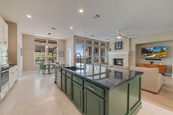 Dining room, Fireplace, Interior, Kitchen, Living room, Recessed Lighting, Wood Texture Flooring