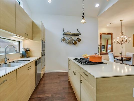 Chandelier, Dining room, Interior, Kitchen, Pendant Lights, Recessed Lighting, Stainless Steel Appliances, Wood Texture Flooring