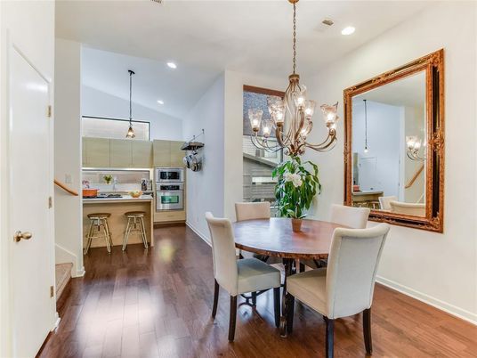 Chandelier, Dining room, Interior, Kitchen, Pendant Lights, Recessed Lighting, Stainless Steel Appliances, Wood Texture Flooring