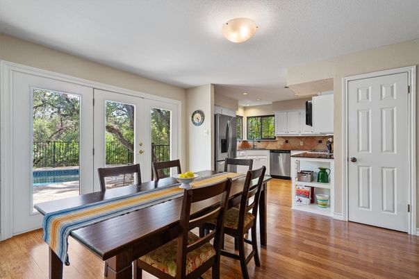 Dining room, Interior, Kitchen, Recessed Lighting, Stainless Steel Appliances, Wood Texture Flooring