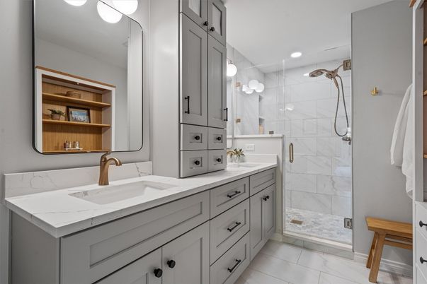 Bathroom, Dual Sink Vanities, Glass Shower, Interior, Marble, Marble Walls, Recessed Lighting