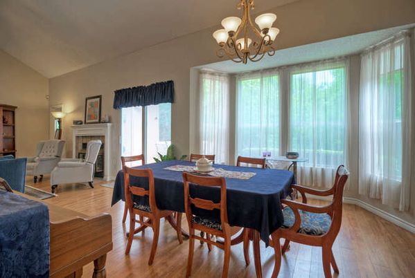Chandelier, Dining room, Fireplace, Interior, Living room, Wood Texture Flooring