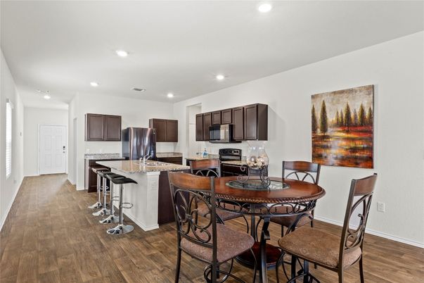 Dining room, Interior, Kitchen, Recessed Lighting, Stainless Steel Appliances, Wood Texture Flooring