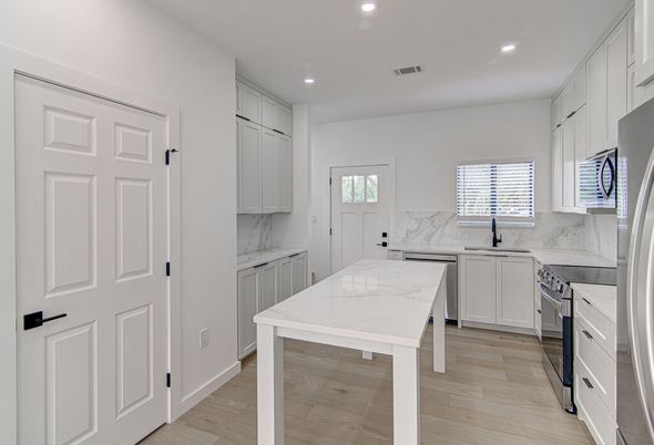 Interior, Kitchen, Marble Walls, Recessed Lighting, Wood Texture Flooring