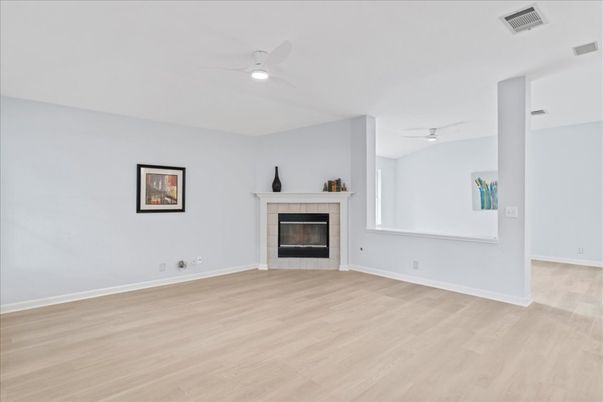 Empty room, Fireplace, Interior, Recessed Lighting, Wood Texture Flooring