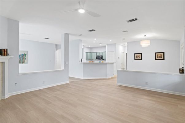 Fireplace, Interior, Kitchen, Pendant Lights, Recessed Lighting, Wood Texture Flooring