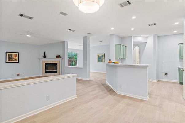 Fireplace, Interior, Kitchen, Recessed Lighting, Wood Texture Flooring