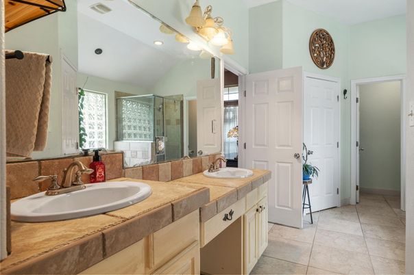 Bathroom, Dual Sink Vanities, Glass Shower, Interior, Recessed Lighting, Tile Countertops