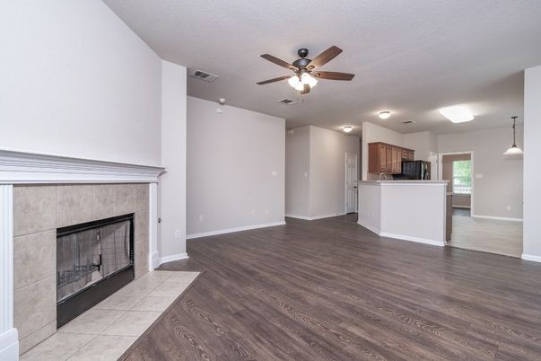 Empty room, Fireplace, Interior, Kitchen, Pendant Lights, Wood Texture Flooring