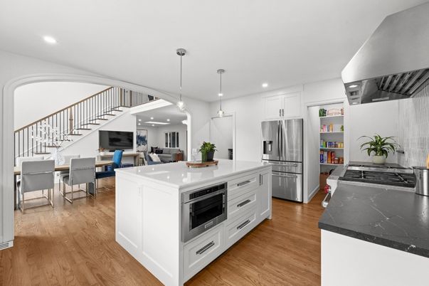Dining room, Interior, Kitchen, Pendant Lights, Recessed Lighting, Stainless Steel Appliances, Wood Texture Flooring