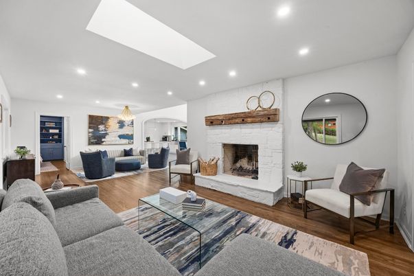 Chandelier, Dining room, Fireplace, Interior, Living room, Recessed Lighting, Wood Texture Flooring