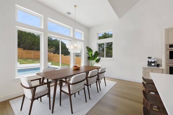 Dining room, Interior, Pendant Lights, Stainless Steel Appliances, Wood Texture Flooring