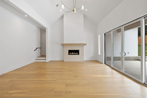 Empty room, Fireplace, Interior, Pendant Lights, Recessed Lighting, Wood Texture Flooring