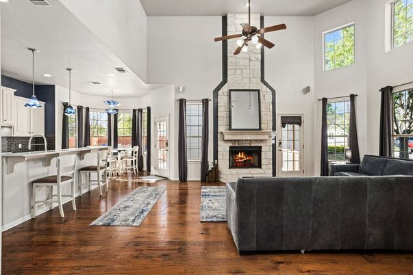 Dining room, Fireplace, Interior, Living room, Pendant Lights, Recessed Lighting, Wood Texture Flooring