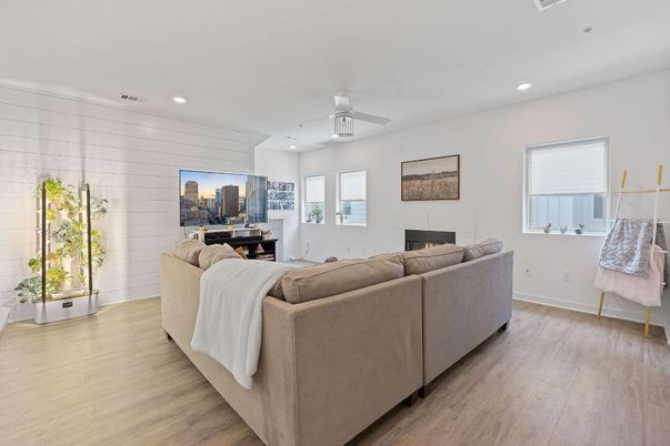 Dining room, Fireplace, Interior, Living room, Recessed Lighting, Wood Texture Flooring